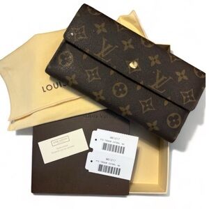 Authentic Louis Vuitton Monogram Portefeuille
International M61217 Long …